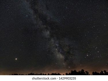 Core Of The Milky Way Over The Tree Tops At John Glenn Astronomy Park In Ohio. 