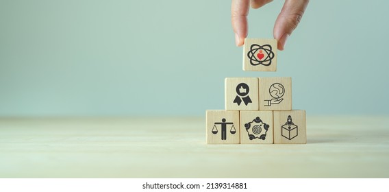 Core values,corporate values concept.  Company culture and strategy related to business and customer relationships, company growth. Principles guide company's action. Core values icon on wood blocks. - Shutterstock ID 2139314881