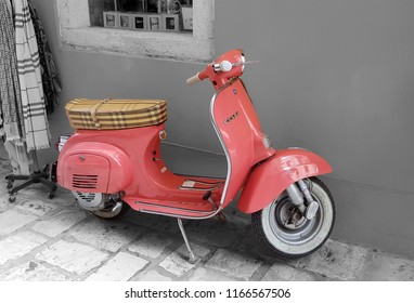 pastel pink vespa