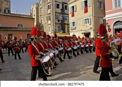 CORFU, GREECE - APRIL 18, 2009: Philharmonic musicians in the customary lament procession on the morning of Holy Saturday, at the old town of Corfu.