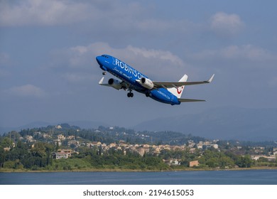 CORFU, GREECE - AUGUST 27 2022 - CORFU SUMMER - Aircraft Boeing 737-86J Of TUI Fly Airline With Registration D-ABKN (Robinson Club Resorts Livery) Shooting From Corfu Airport.