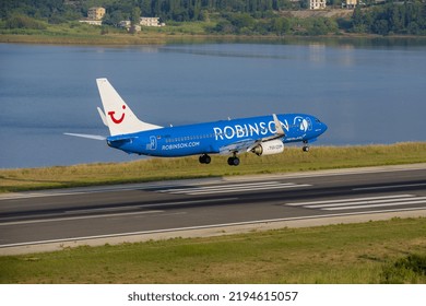 CORFU, GREECE - AUGUST 27 2022 - CORFU SUMMER - Aircraft Boeing 737-86J Of TUI Fly Airline With Registration D-ABKN (Robinson Club Resorts Livery) Shooting From Corfu Airport.