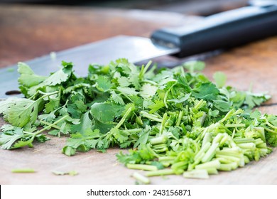 Coriander On Chopping Board