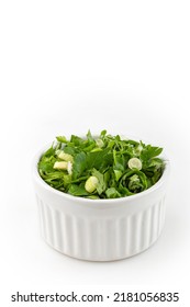 Coriander In Ramekin Isolated On White Background.