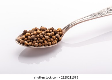 Coriander Seeds In A Cupronickel Spoon Close Up