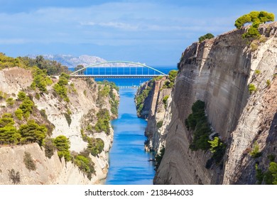 The Corinth Canal is a canal that connects the Gulf of Corinth with the Saronic Gulf in the Aegean Sea. It cuts Isthmus of Corinth and separates Peloponnese from the Greek mainland.