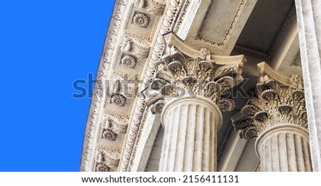 Corinthian pilasters on Kazan cathedral, classical order of Ancient Greek and Roman architecture, blue sky background