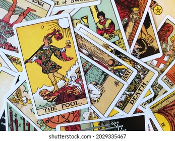 Cork - August 19, 2021: Picture of The Fool tarot card from the original Ride Waite tarot deck with mixed tarot cards in the background