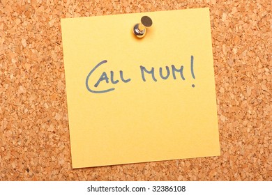 Cork background with a note. ( Call Mum)
