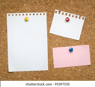 cork board with blank notes