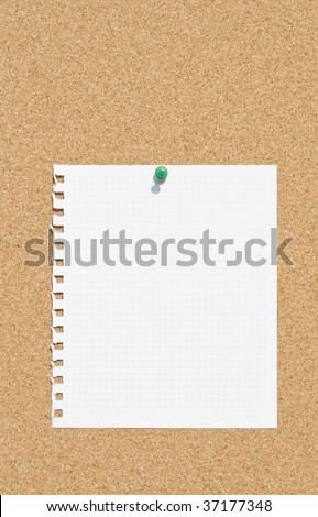 cork board with blank sheet, squared paper
