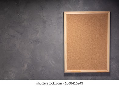cork board at concrete painted wall background texture surface