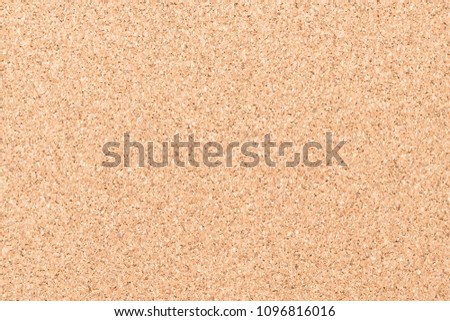 Cork board with corkboard texture background brown grainy backdrop for blank bullentin, advertisment, memo notice or noticeboard announcement