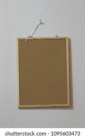Cork board on the wall - Shutterstock ID 1095603473