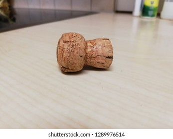 Cork cap stopple close up on wood surface 