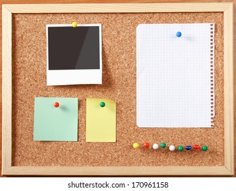 Cork Message Board With Various Paper Notes