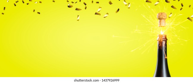 Cork Popper And Raining Gold Confetti On Yellow Empty Background, Black Champagne Bottle At The Edge Of Yellow Background, Festive Graphical Party Backdrop Concept, Free Space