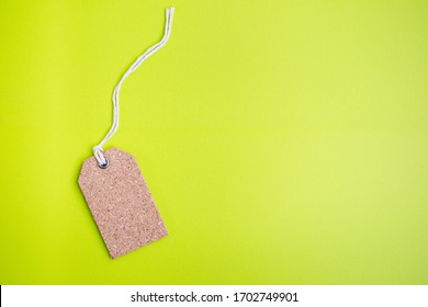 Corkboard Tag Isolated On Light Green Background