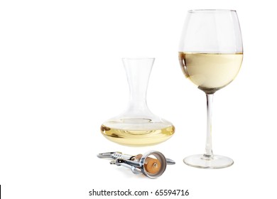 Corkscrew In Front Of A White Wine Glass And A Carafe