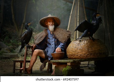 Cormorant Fisherman And Teal After A Fishing