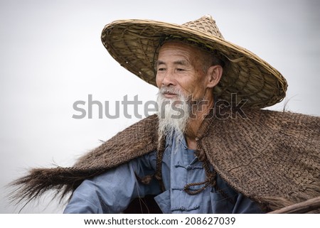Cormorant fisherman in Yangshuo, Guangxi, China.