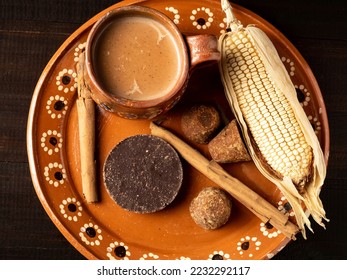 Corn atole with chocolate, champurrado, traditional Mexican cuisine. - Shutterstock ID 2232292117