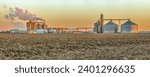 Corn based ethanol plant at sunset in an agricultural landscape.