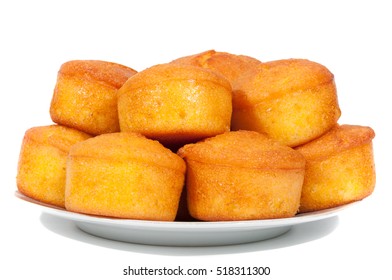 Corn Bread On A Plate Partially Isolated On White Background.