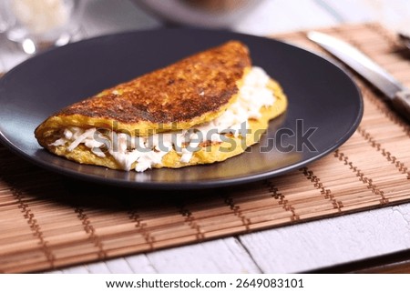 Corn cachapas with white cheese, typical Venezuelan dish.