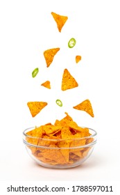 Corn Chips In Bowl And Falling Chips And Pepper