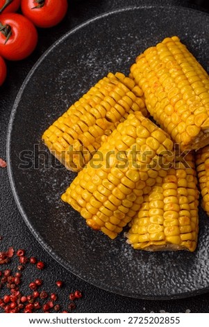 Corn cob cooked in chunks, vegetables, healthy vegetarian food. Boiled corn as a food background for your design
