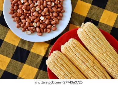 Corn cobs and roasted peanuts. Concept of traditional Brazilian June Festival (Sao Joao) food. Festa Junina. 