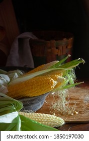 Corn Cobs In Vintage Copper Plate On The Wooden Table In A Farm Moody Kitchen