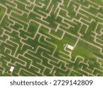 Corn field maze creating complex agricultural puzzle from above