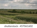 Corn fields and windmills used to create ethanol and electricity make up a large part of the landscape in Iowa.