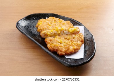 Corn Fish Cake Served In A Dish Isolated On Wooden Table Background Side View Of Singapore Food