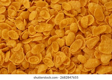 Corn flakes background and texture close up. Cornflake cereal box for morning breakfast