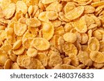 Corn flakes background and texture, cornflake cereal box for morning breakfast.