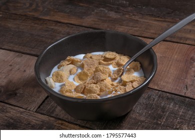 Corn Flakes With Milk And Banana Chunks For Breakfast