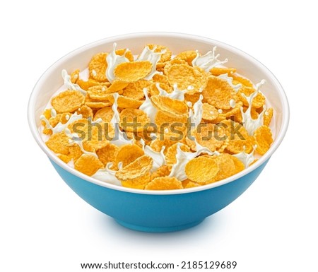 Corn flakes with milk splashes isolated on white background