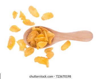 Corn flakes in wooden spoon isolated on white background - Powered by Shutterstock