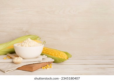 Corn flour with fresh cobs on wooden table - Powered by Shutterstock