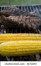 Corn On The Cob And Steak On A Bbq Grill