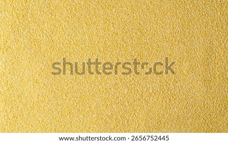 Corn polenta uncooked, background and texture
