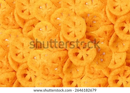 Corn puff snack pattern, crunchy cereal nosh pile, crispy yellow rice breakfast with paprika, corn puff snack heap textured background