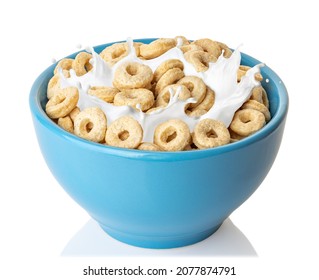 Corn Rings In Blue Bowl. Breakfast Cereal With Splashing Milk Isolated On White Background