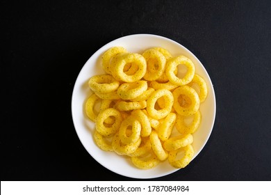 Corn rings with spices in a bowl