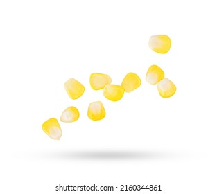 Corn Seeds Falling In The Air Isolated On White Background.