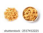 Corn snack in white bowl with pile corn snack isolated on white background. top view

