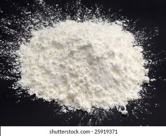 Corn Starch Isolated At Black Background
